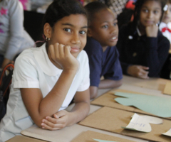 Smiling girl in art class