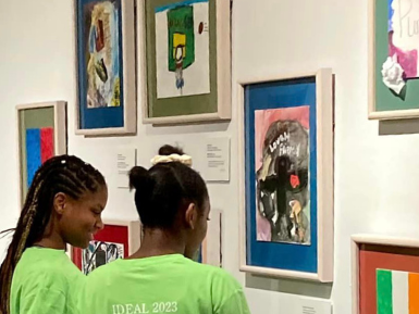 students view work on display at museum gallery