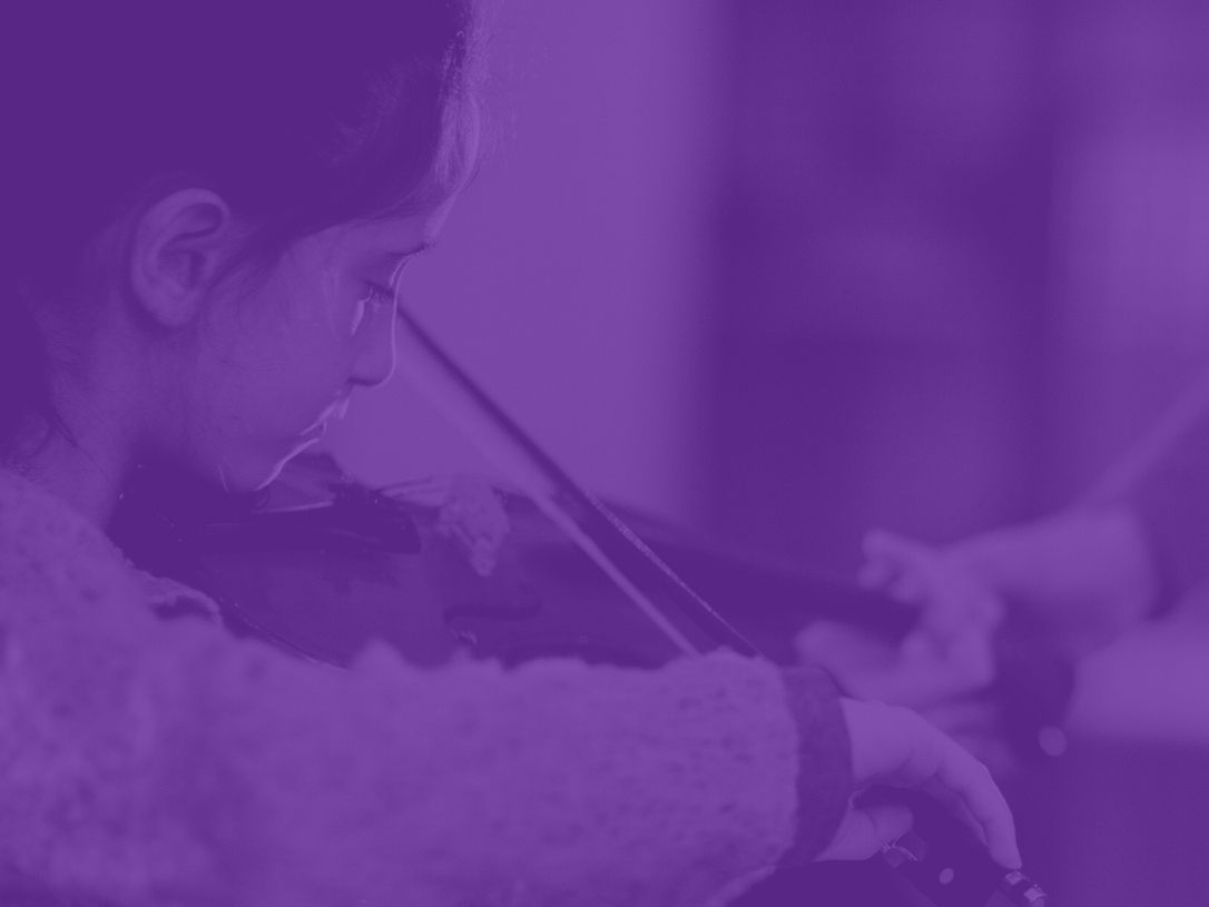 purple overlay over student playing violin